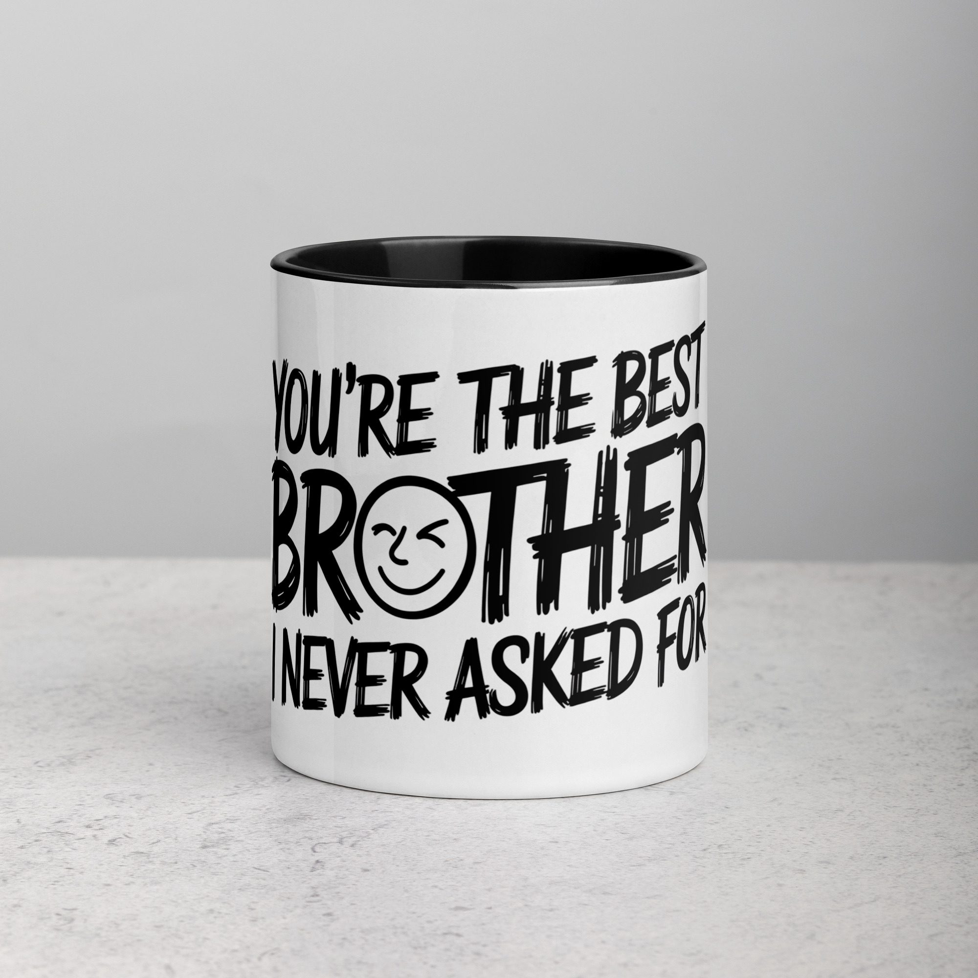 white-ceramic-mug-with-color-inside-black-11-oz-front-673def7c36a16.jpg You’re the Best Brother I Never Asked For Coffee Mug - Image 1