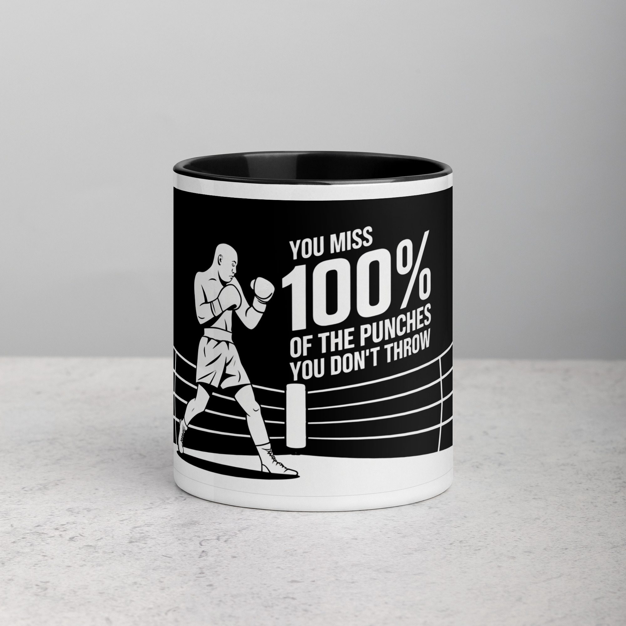 white-ceramic-mug-with-color-inside-black-11-oz-front-675bc7f0e6805.jpg You Miss 100% of the Punches You Don’t Throw Boxing Mug - Image 1