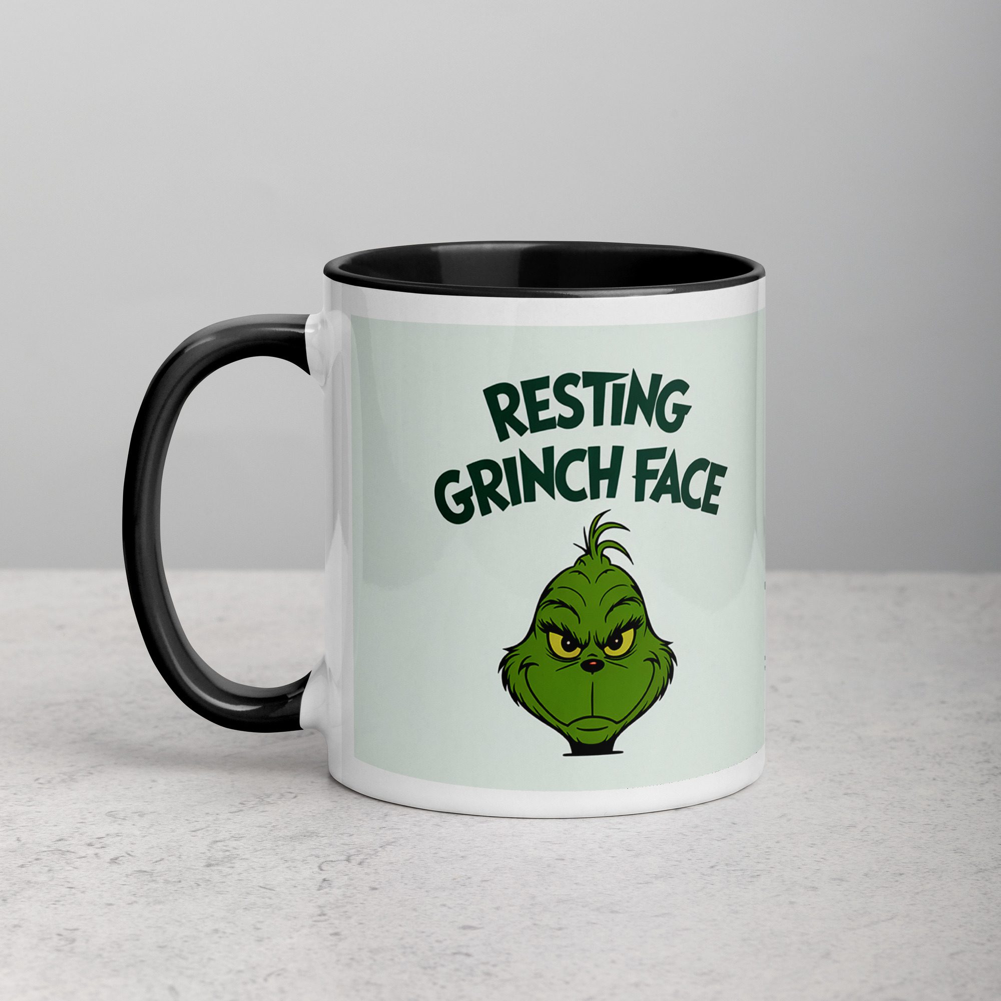 white-ceramic-mug-with-color-inside-black-11-oz-left-67702629d4dd2.jpg Resting Grinch Face Christmas Coffee Mug - Image 1